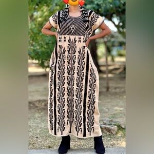 Elegant Black and Cream Patterned Dress